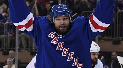 New York Rangers right wing Rick Nash reacts after he...