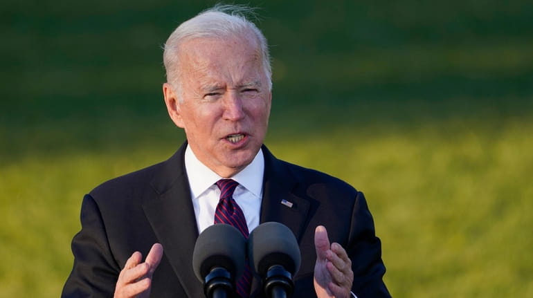 President Joe Biden speaks before signing the bipartisan infrastructure bill into...