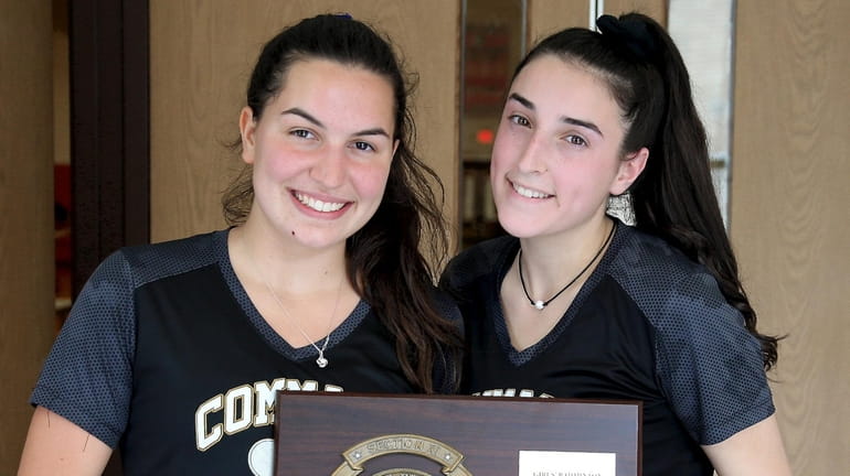 Commack co-captains Emily Haber and Kim Colella pose with the...