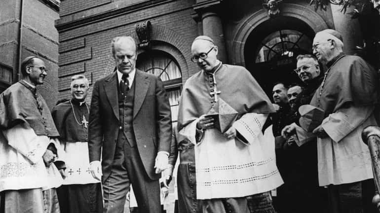 President Gerald Ford and Cardinal William Baum leave the rectory...