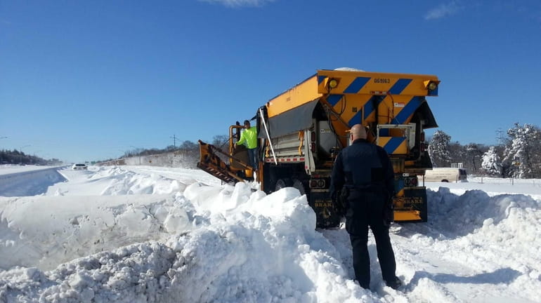 A New York State DOT plow is stuck on the...