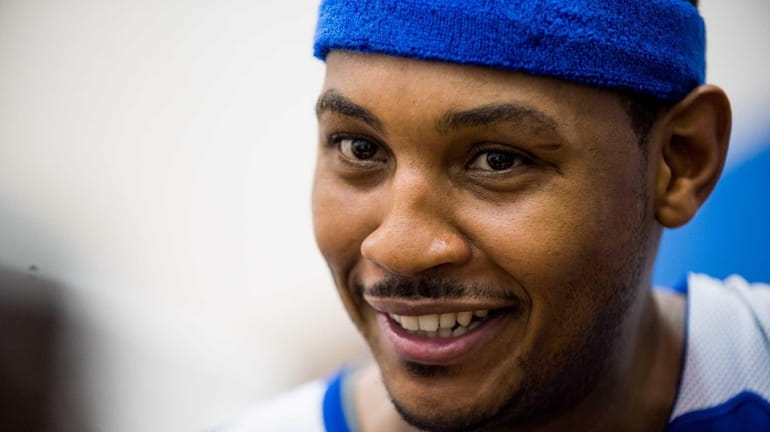 Knicks forward Carmelo Anthony smiles during training camp at the...