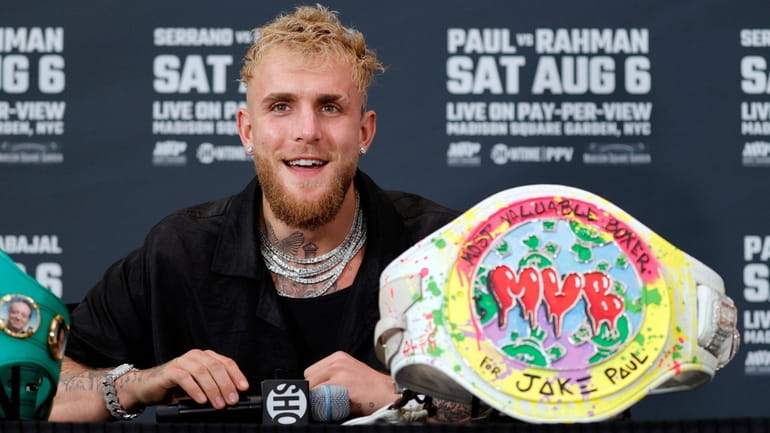 Jake Paul answers questions from the media during a press...