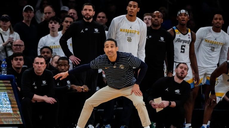 Marquette head coach Shaka Smart reacts during the second half...
