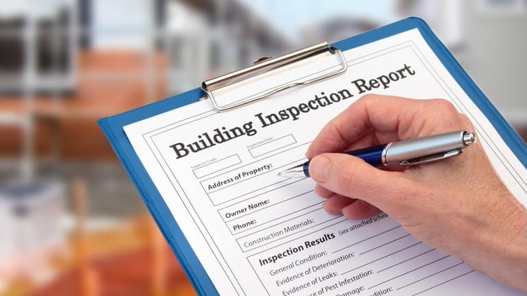 Tom D'Agostino, an inspector with Ronkonkoma-based Long Island Home Inspection...