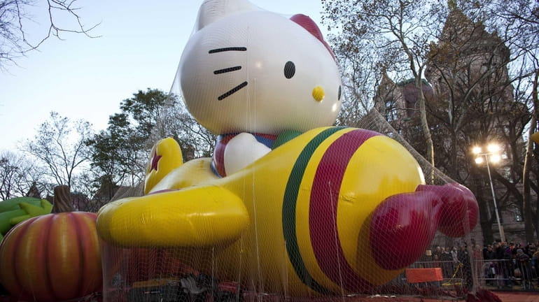 Inflated balloons for the Macy's Thanksgiving Day parade are covered...