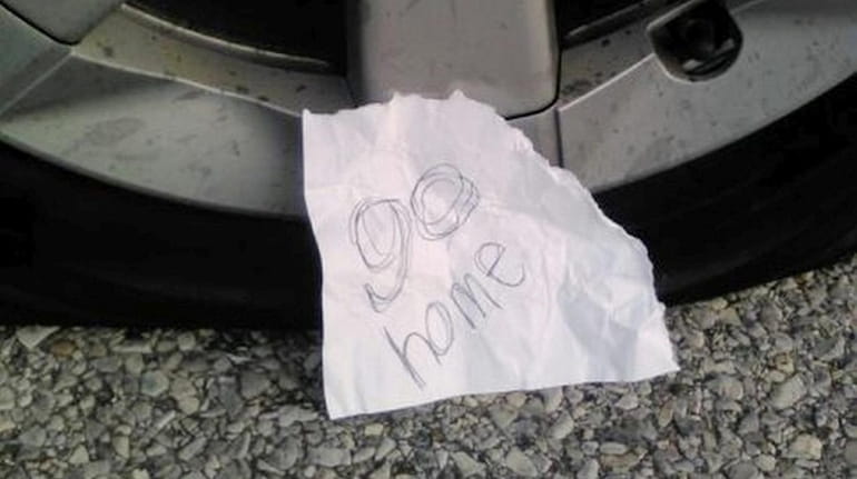 A tire was punctured and this note was found on...