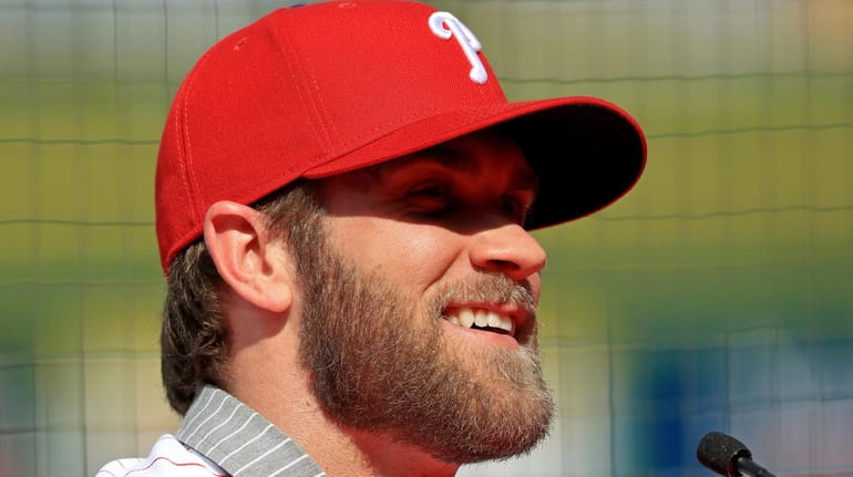 Bryce Harper is introduced to the Philadelphia Phillies during a...