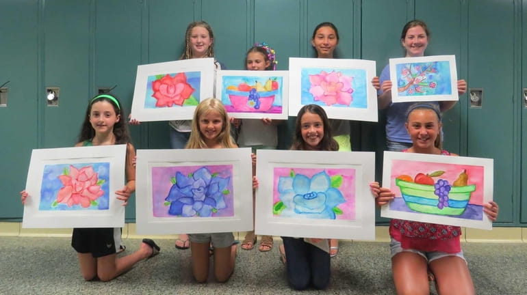 Students from the Massapequa school district show off the watercolor...