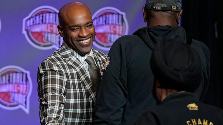 Vince Carter greets guest before the Basketball Hall of Fame...