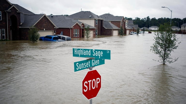 Houses at the Highland Glen subdivision are flooded by Hurricane...