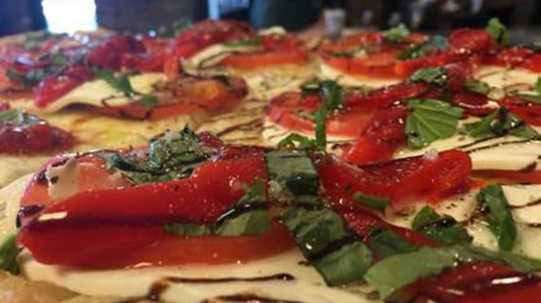 Focaccia pizza at Gino's of Kings Park is a thin...