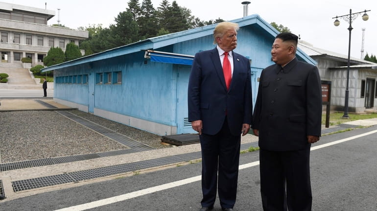 President Donald Trump meets with North Korean leader Kim Jong...