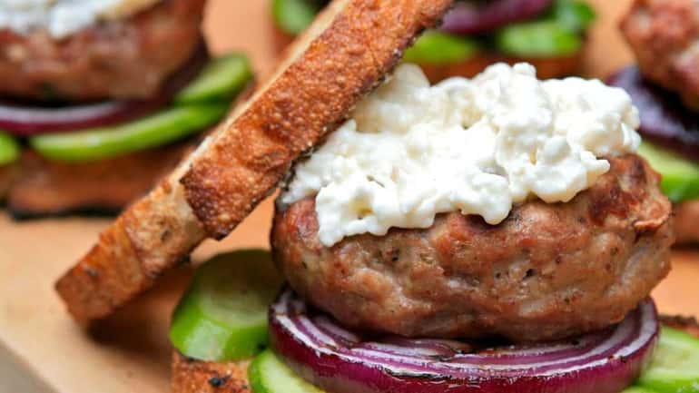 Burgers made from lean ground turkey, capers and mustard get...