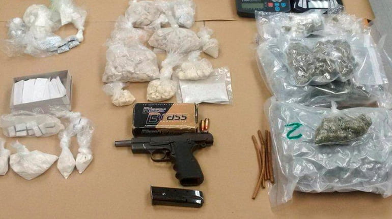 Drugs, cash and a handgun were seized after Suffolk County...