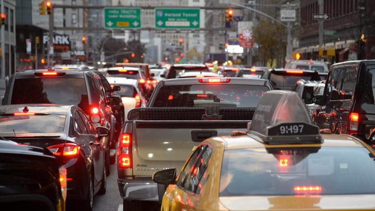 Traffic waiting to enter the Holland Tunnel in Manhattan in...