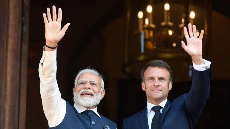 French President Emmanuel Macron and India's Prime Minister Narendra Modi...
