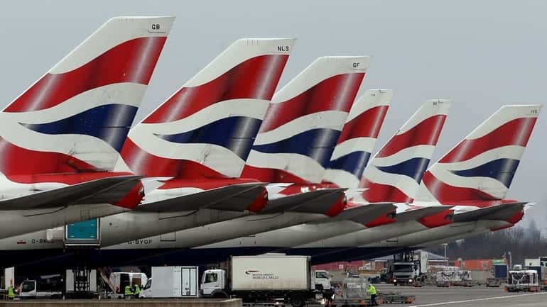 British Airways jets grounded at Heathrow Airport in London as...