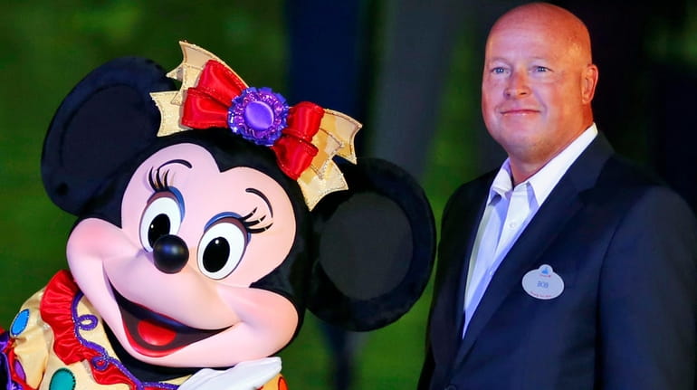 Chairman of Walt Disney Parks and Resorts Bob Chapek poses...