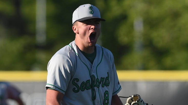 Billy Kind #8 of Seaford reacts after striking out the...
