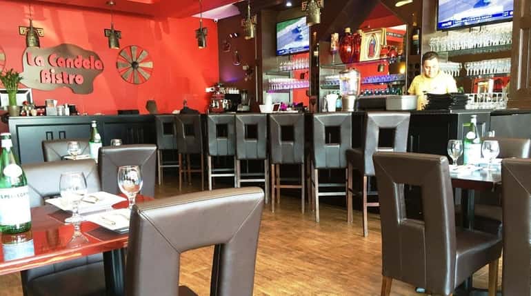 Candela Bistro focuses on meat, including rotisserie chicken, a Peruvian...