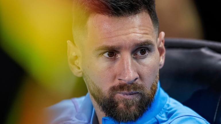 Argentina forward Lionel Messi sits before the team's international friendly...