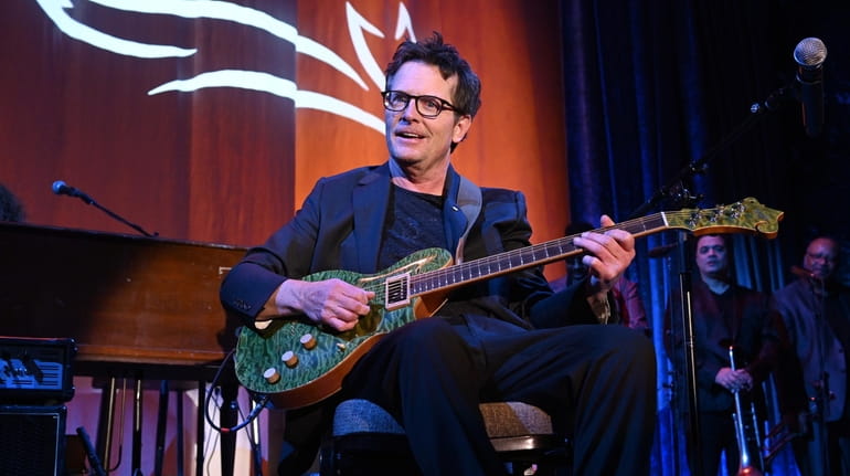 Michael J. Fox performs onstage at A Funny Thing Happened...