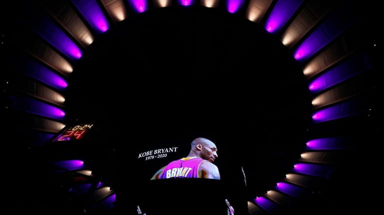 Kobe Bryant is remembered prior to the start of a...
