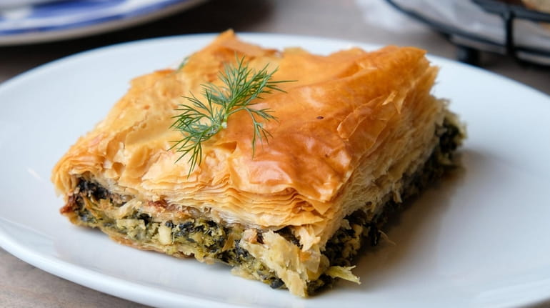 Spanakopita, spinach pie, was among the starters at Ara Greek Kitchen & Bar. ...