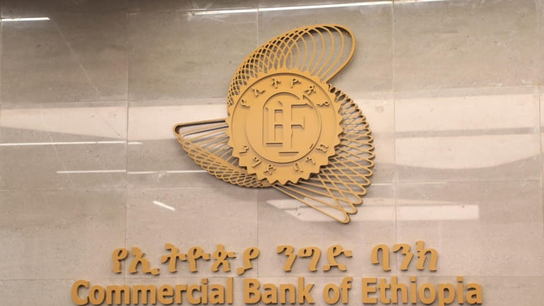 Commercial Bank of Ethiopia signage seen outside a branch in...