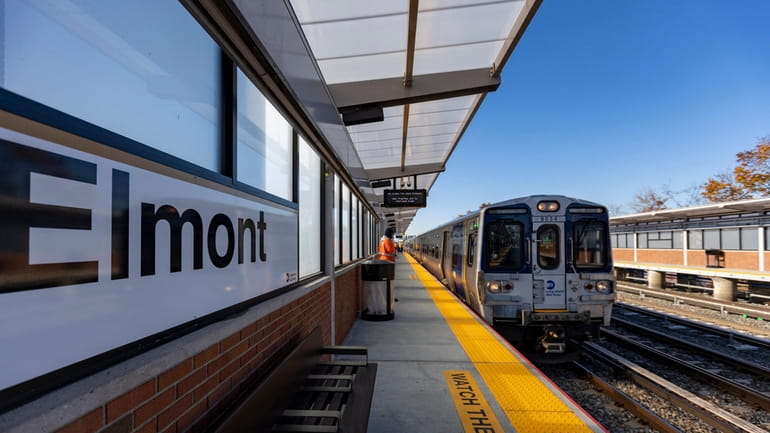 An LIRR train arrives at the Elmont station.