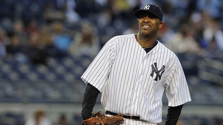 CC Sabathia reacts in the first inning of a game...