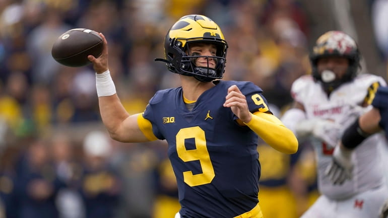 Michigan quarterback J.J. McCarthy throws against Maryland in the second...