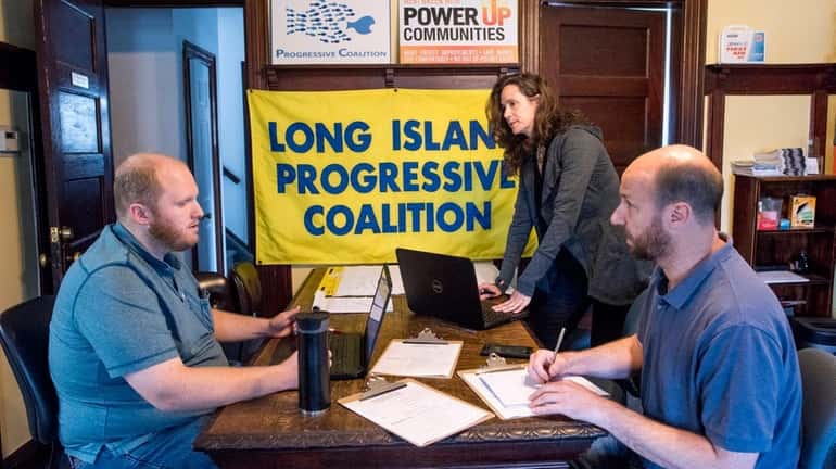 Long Island Progressive Coalition officials, from left, Dan Fingas, Lisa...