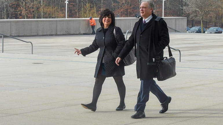 Linda Mangano and former Nassau County Executive Edward Mangano arrive at...