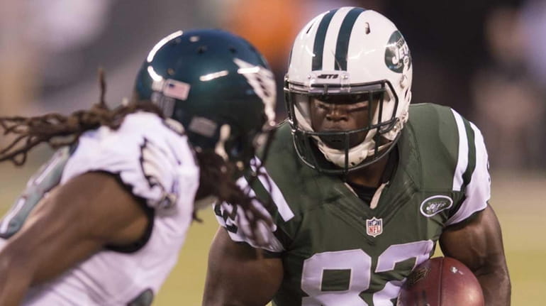 New York Jets wide receiver Quincy Enunwa runs with the...