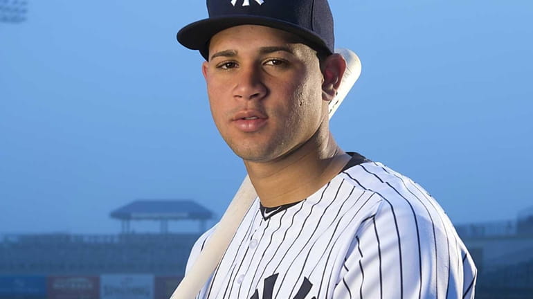 Yankees catcher Gary Sanchez poses on picture day during spring...