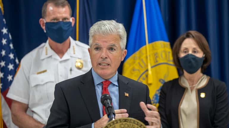 Suffolk County Executive Steve Bellone and Police Commissioner Geraldine Hart...