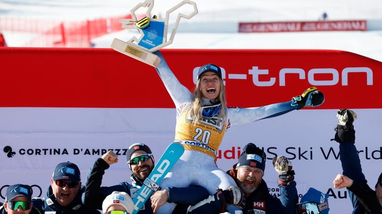The winner Norway's Ragnhild Mowinckel celebrates after an alpine ski,...