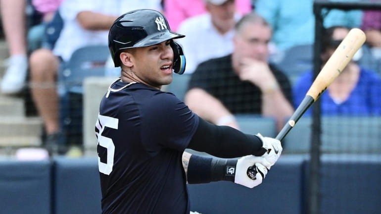 Gleyber Torres of the Yankees hits a single in the fourth inning...