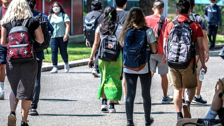 Students on the Stony Brook University campus last August. Local SUNY officials reacted favorably...