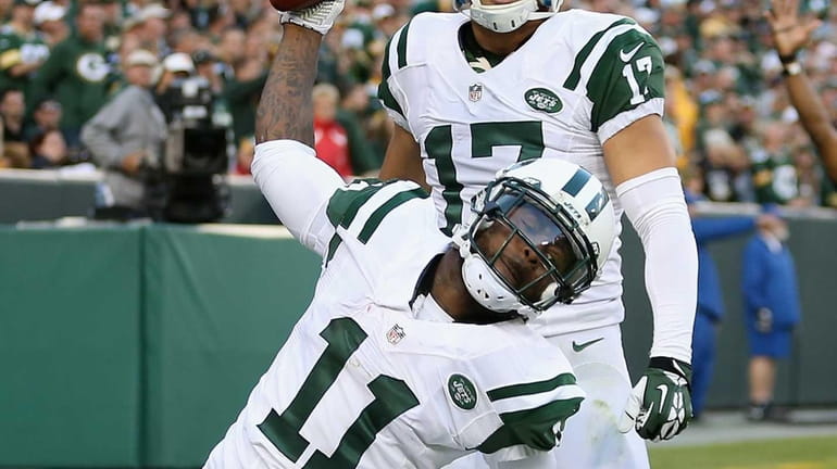 Wide receiver Jeremy Kerley #11 of the Jets spikes the...