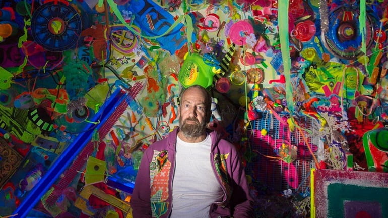 Kenny Scharf in his "Cosmic Cavern" installation at the Nassau...