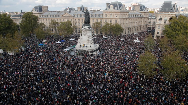 Hundreds of people gather on Republique square during a demonstration...