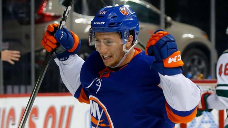 Tanner Fritz #56 of the New York Islanders celebrates his...