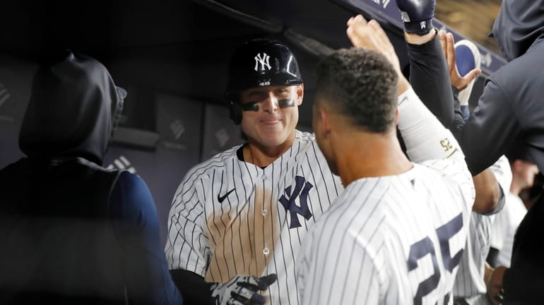 Anthony Rizzo #48 of the Yankees celebrates his eighth inning two-run...