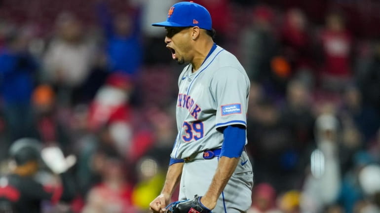 Edwin Díaz of the Mets yells as he reacts to...