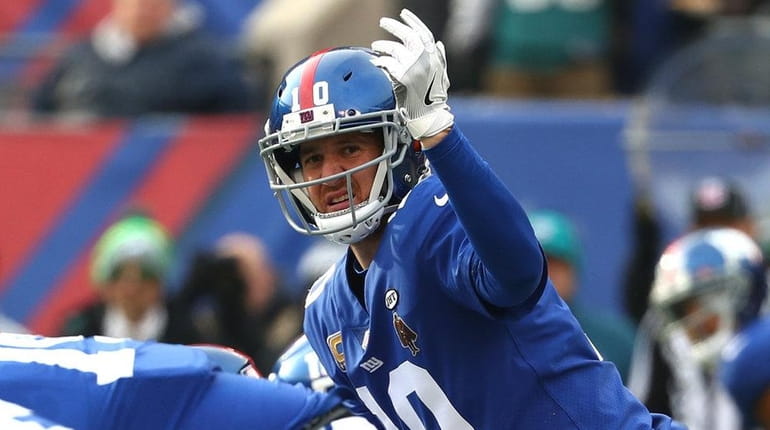 Eli Manning calls a play against the Philadelphia Eagles at...