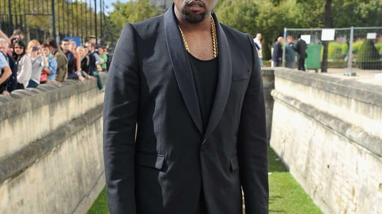 Kanye West arrives at the Christian Dior Spring / Summer...