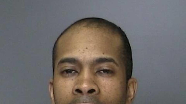 Reginald Ross, 37, of Yaphank, is charged with two counts...